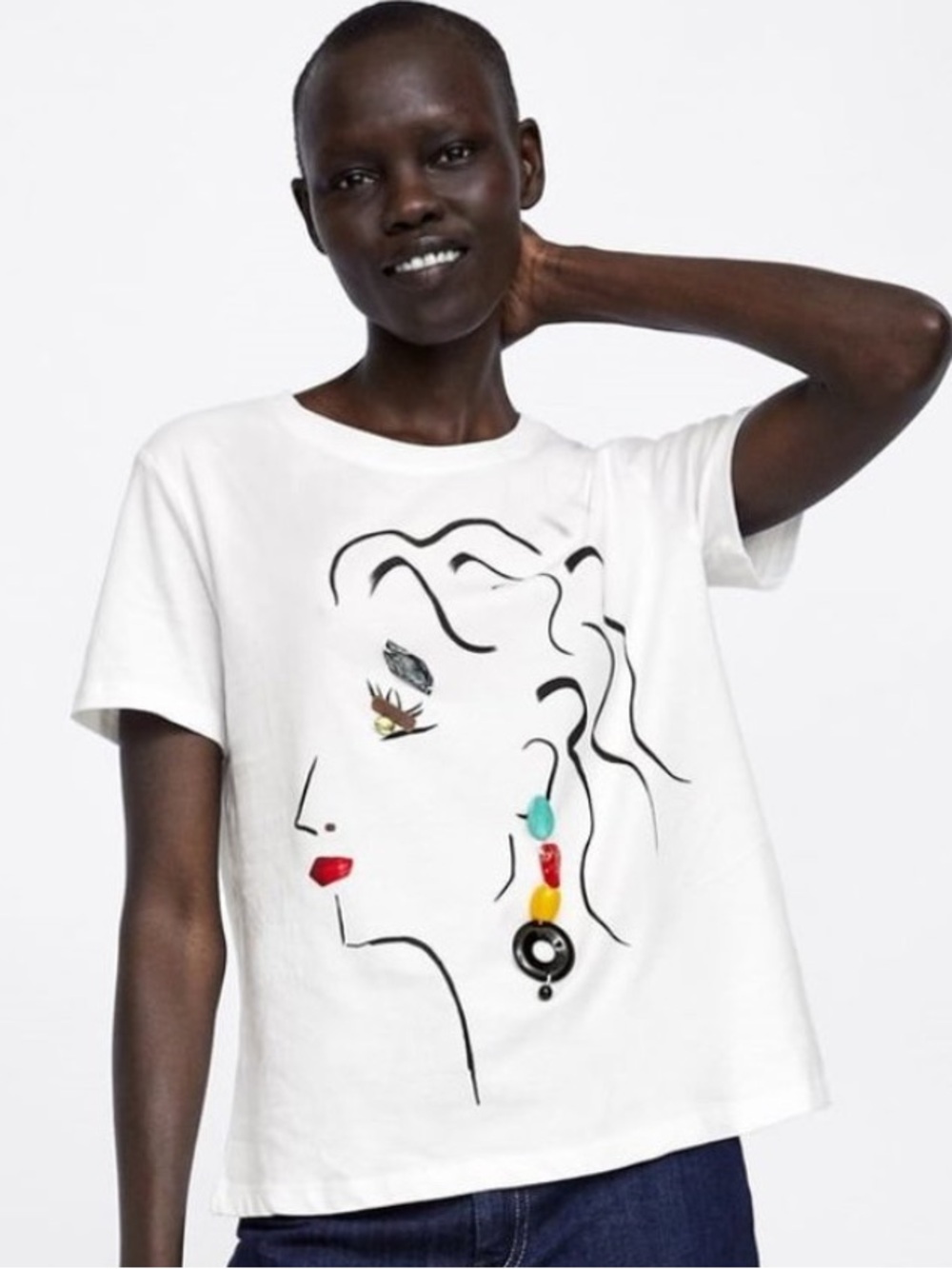 Zara White Tee with Abstract Face and beaded earring